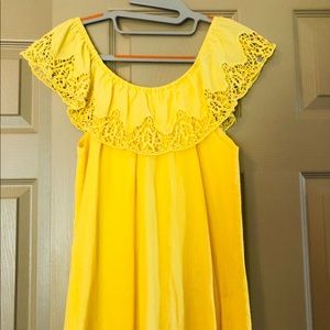 Off the shoulder yellow top.
